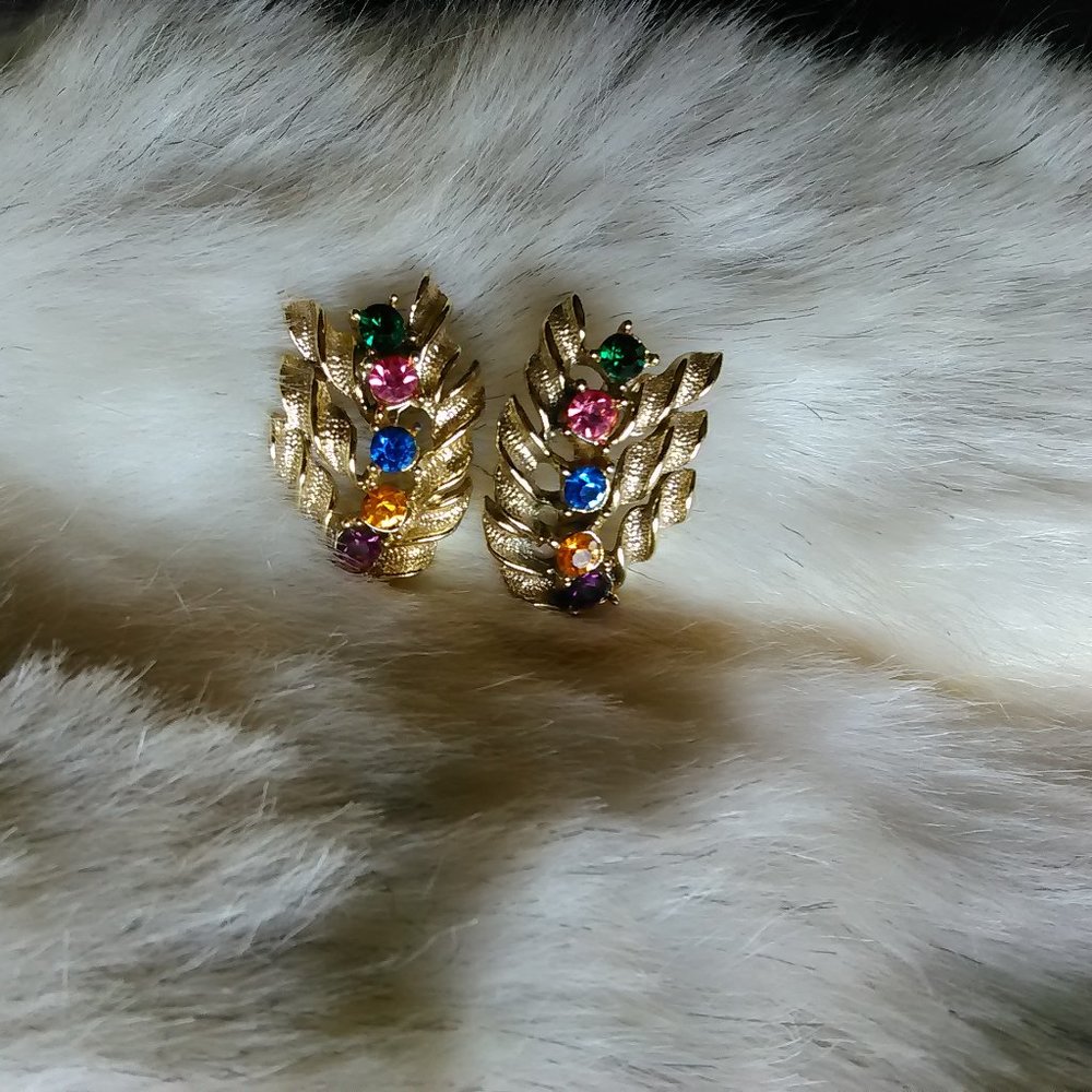 Gold metal leaf with stones screw back earrings.